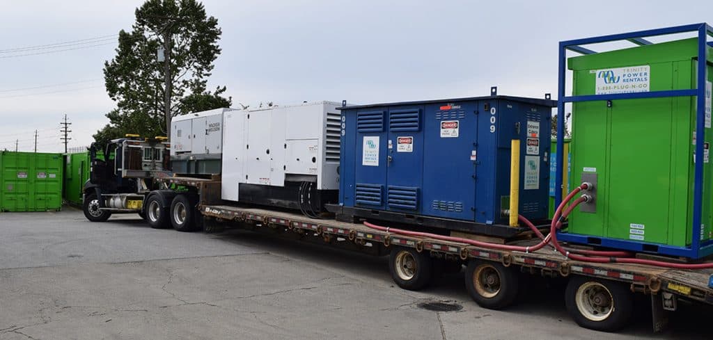 A truck transporting power generators