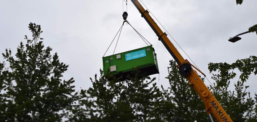 Crane lift a substation transformer