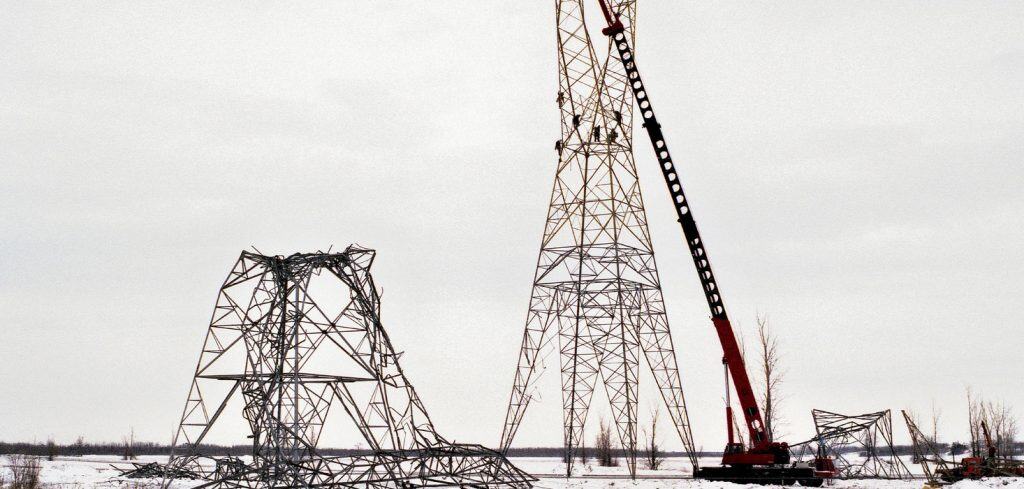 A damaged power line tower