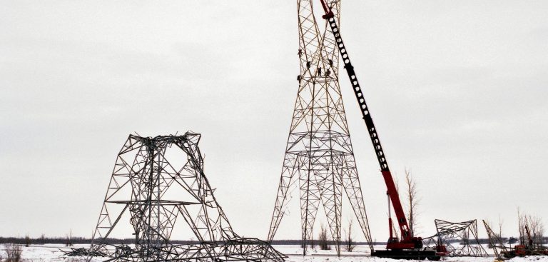 A damaged power line tower