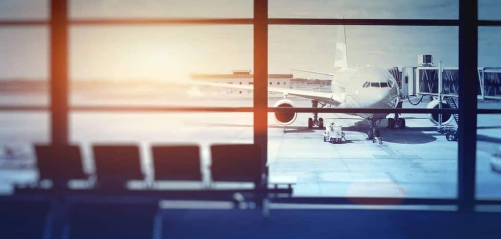 Passenger jet at gate.