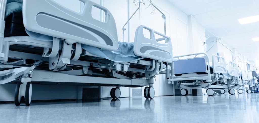 A long corridor in Hospital with surgical beds.