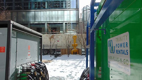 Temporary power equipment in a square downtown.