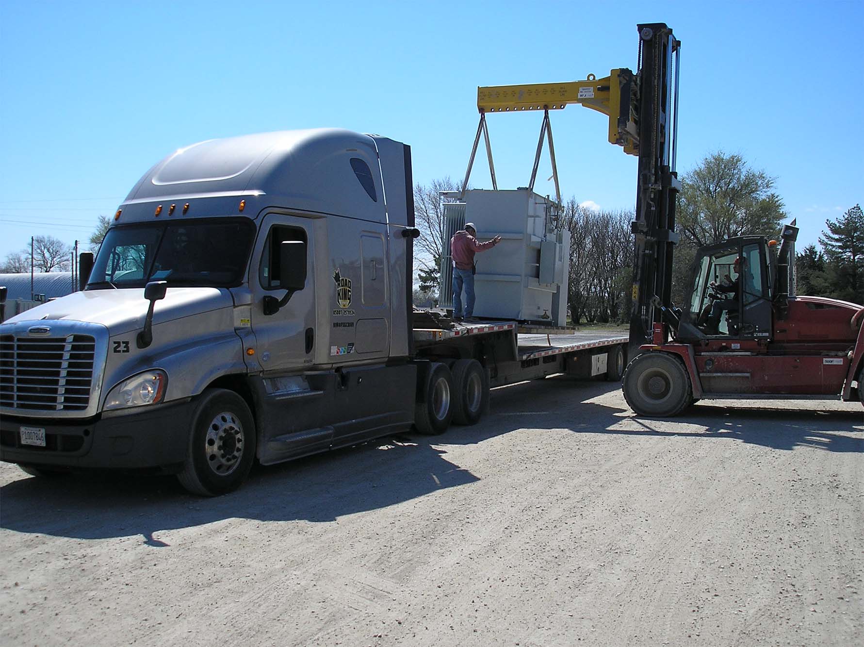 loading transformer onto truck