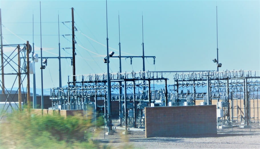 Electrical transformers and towers in power plant