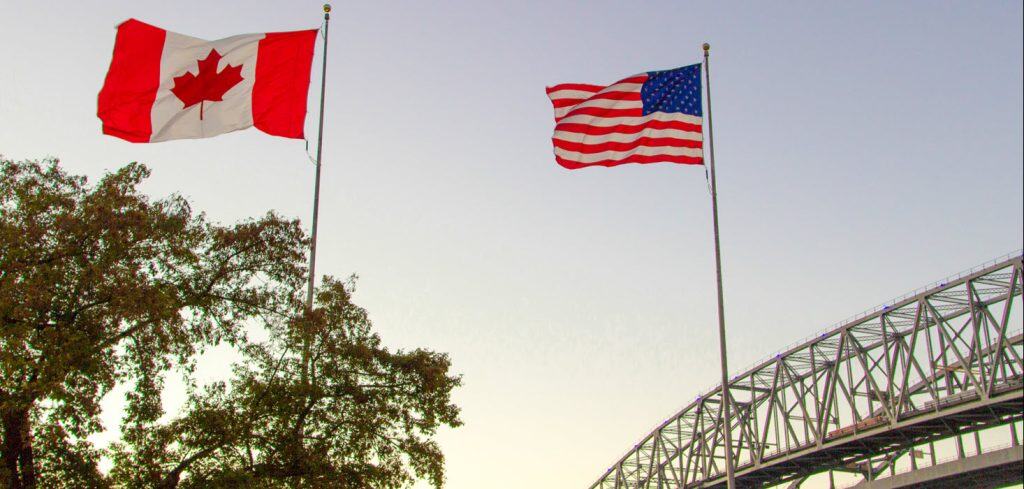 Canadian and American flags
